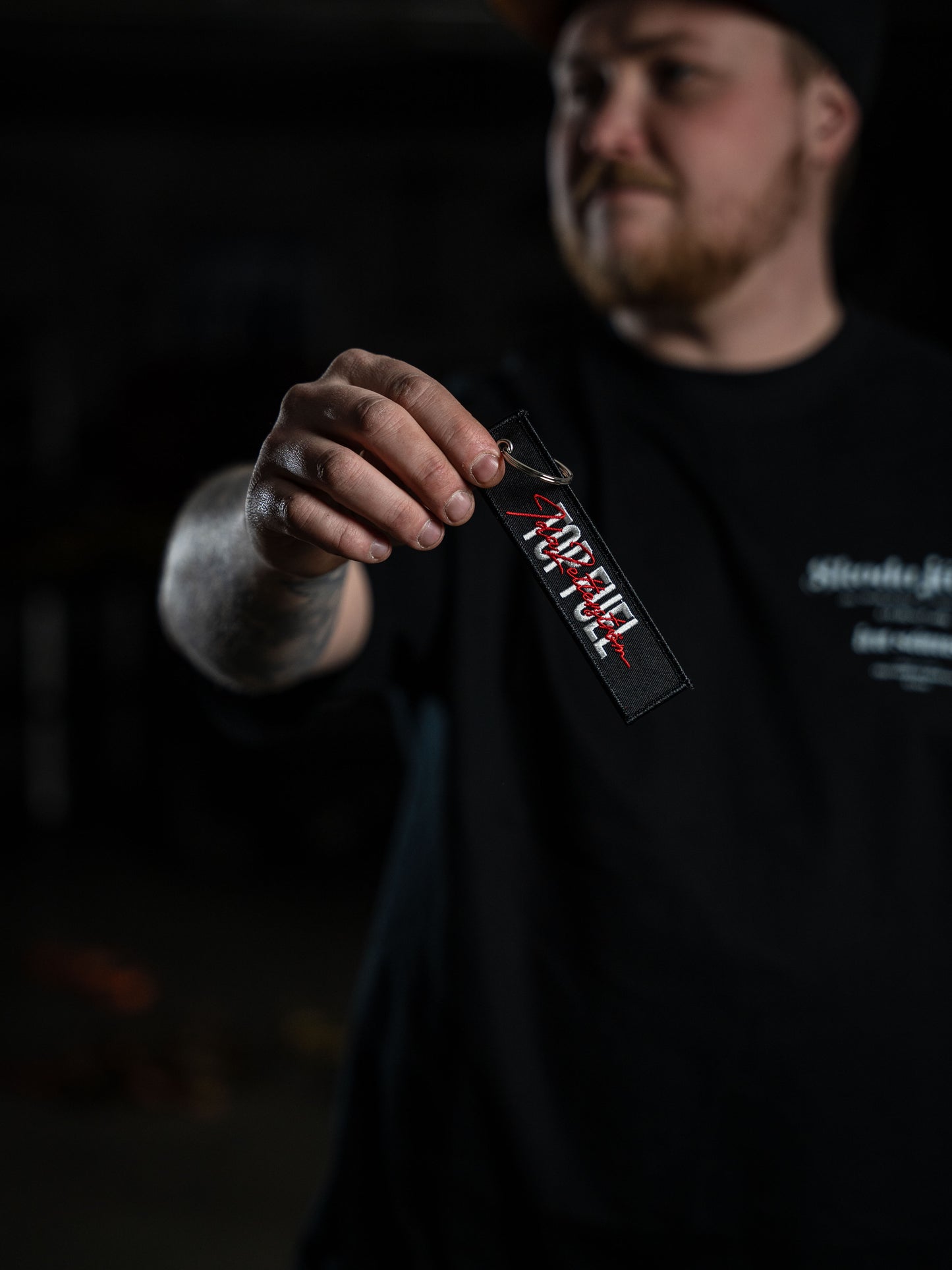 Ida Zetterström Keychain - Remove before Race - Black